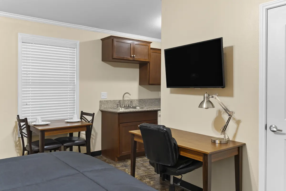 Bayou desk, dining table and TV