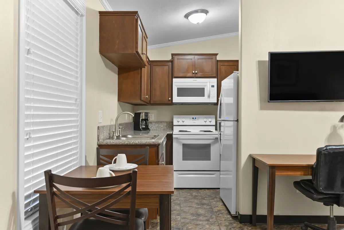 Bayou full kitchen with range, oven and full-size refrigerator