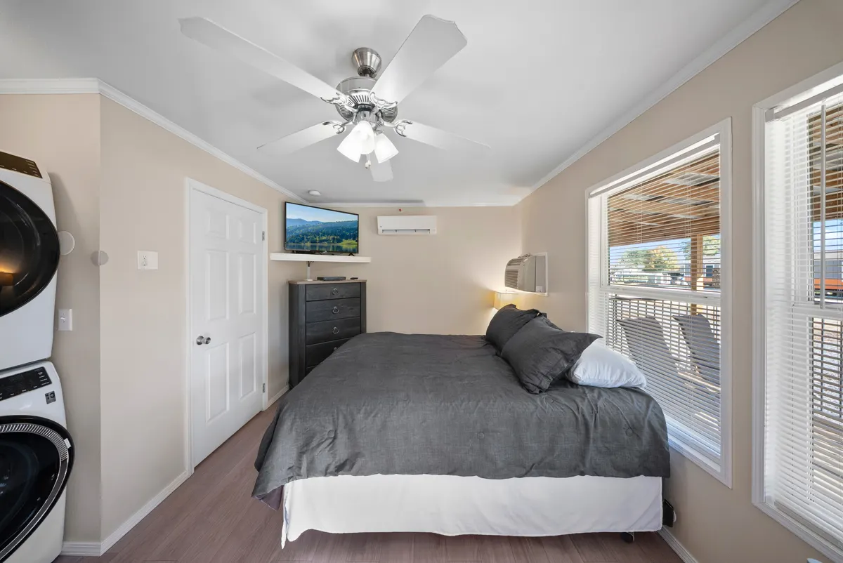 Cypress queen bed by the window